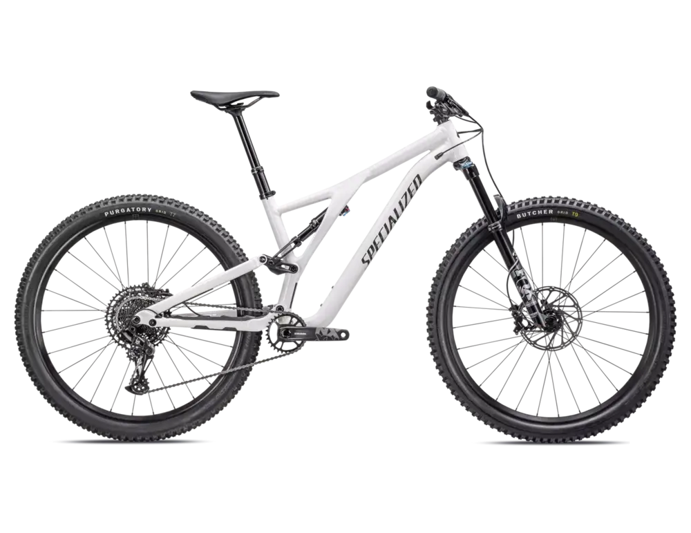 The 2023 Specialized Stumpjumper Alloy mountain bike in a sleek white and black color scheme