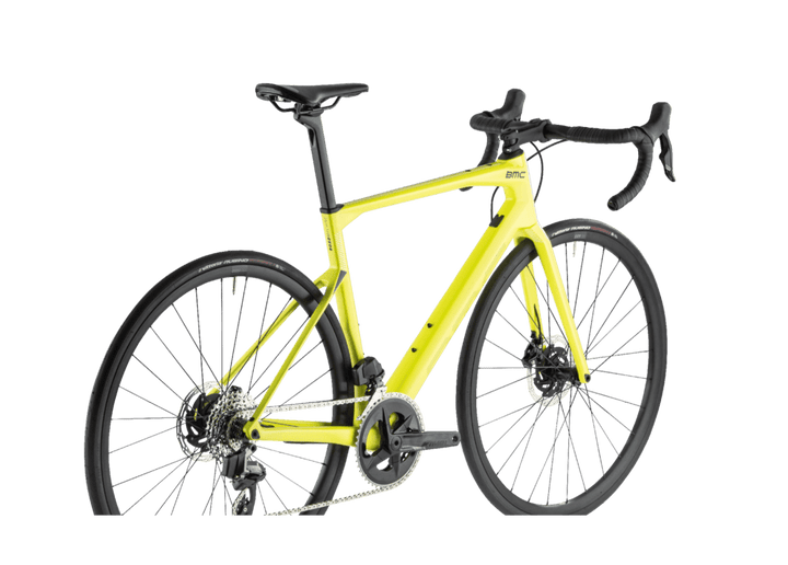 A clear back view of 2022 ROADMACHINE FOUR - A versatile endurance bike in yellow